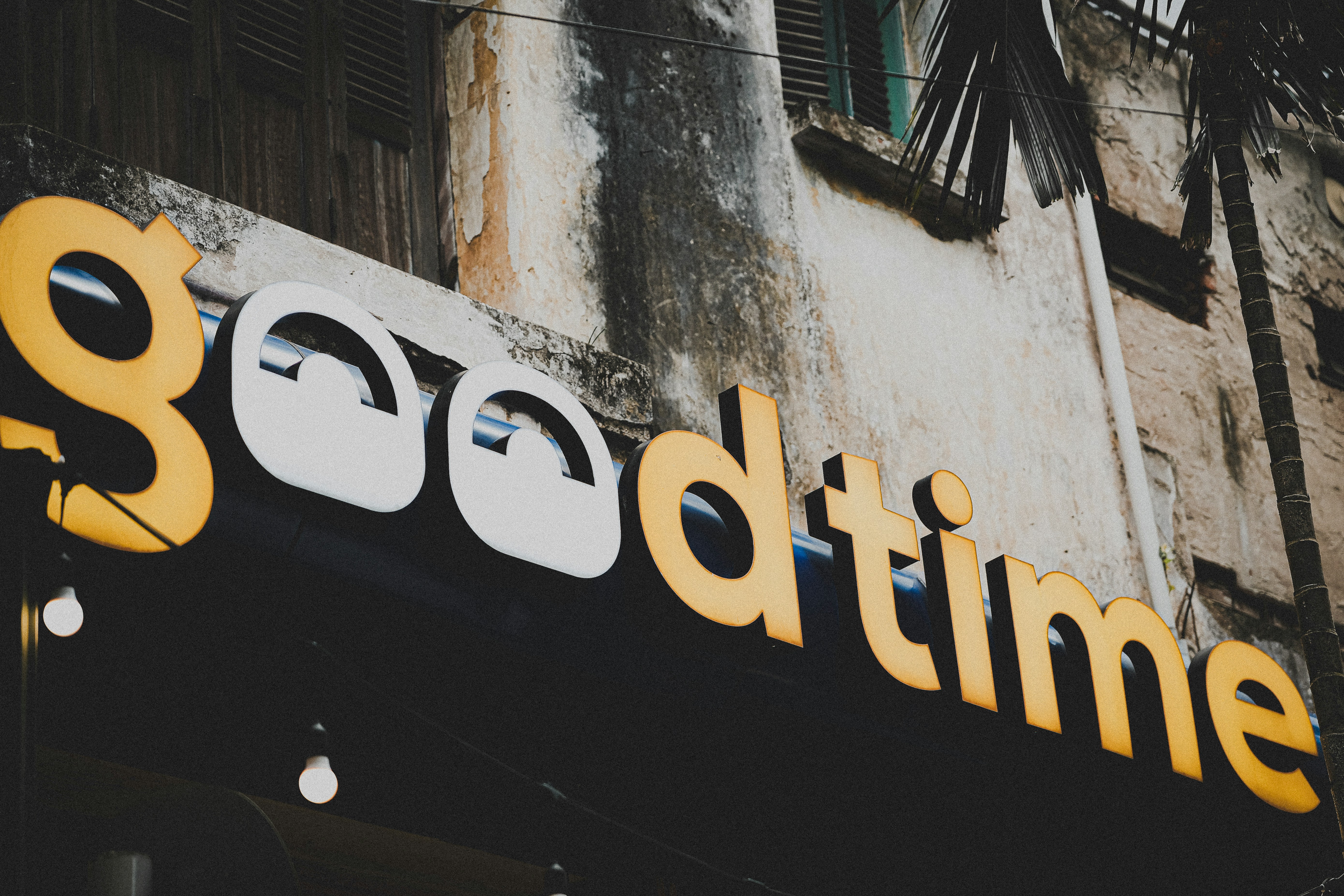 a close up of a sign on the side of a building